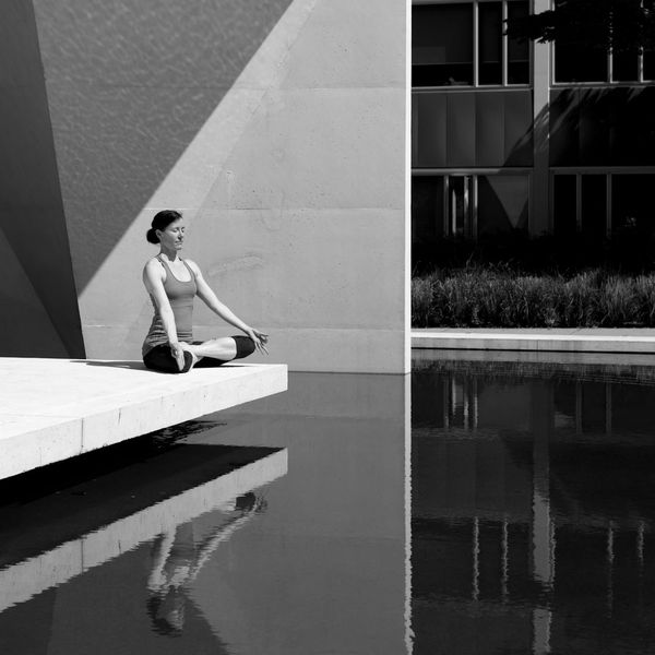 Person meditating in a calm environment, symbolizing mental clarity.